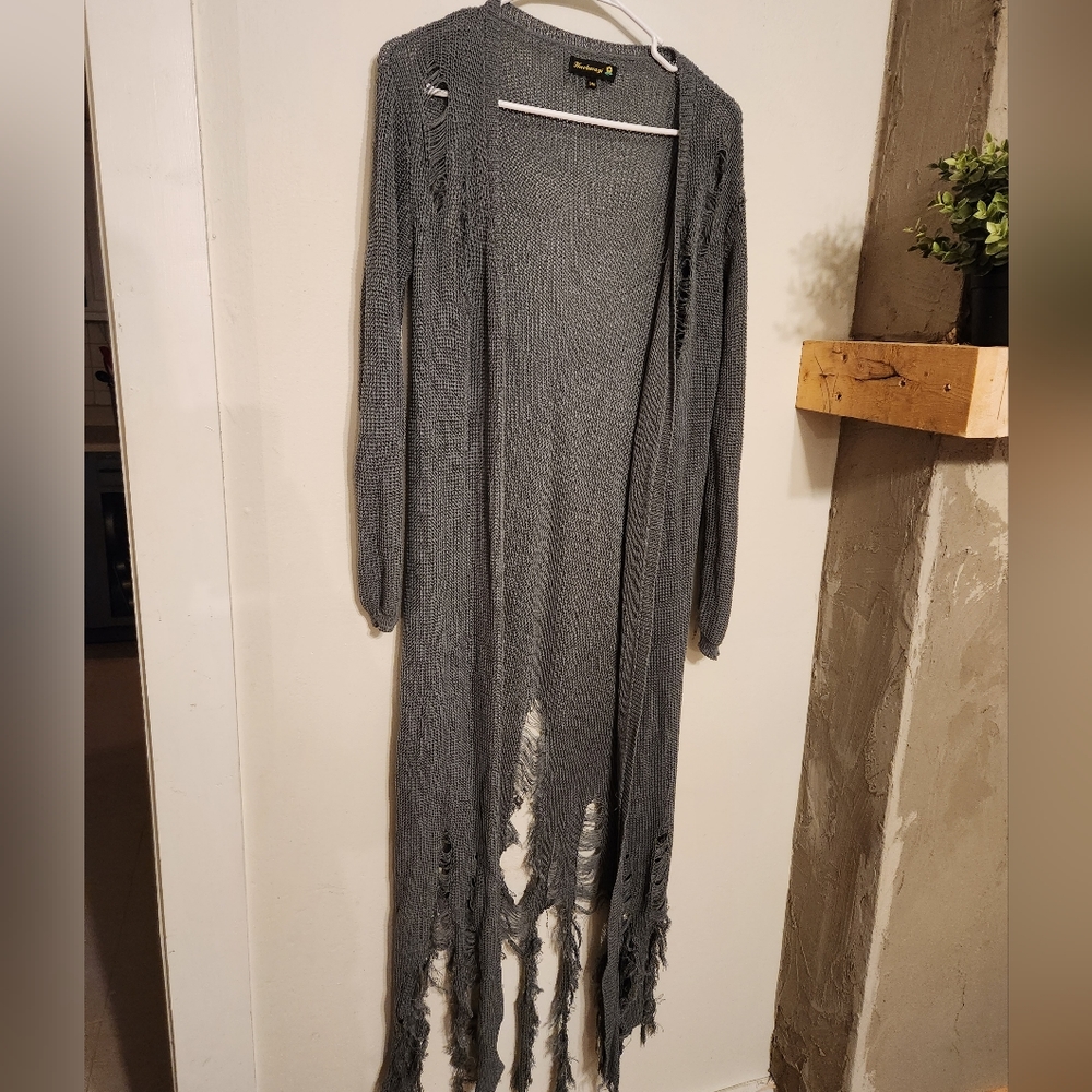 Ripped boutique cardigan